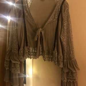 Tie blouse in grey-green, bell sleeves, lace trim.